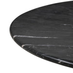 A material-driven piece inspired by post-modernism. A subtly organic round tabletop pairs with a swooped, sculptural pedestal base. Made from black marble for a striking, timeless look, with contrasting white veining playing up this piece's curves.As enthusiasts of luxe aesthetics at Amethyst, we love the designer inspired Oric Bistro Table. Amethyst Home provides interior design, new home construction design consulting, vintage area rugs, and lighting in the Winter Garden metro area.