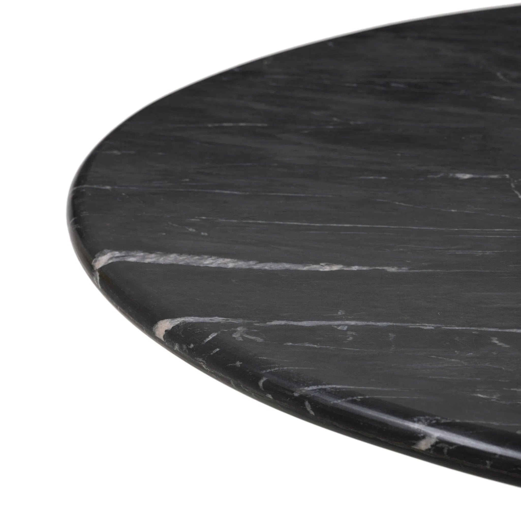 A material-driven piece inspired by post-modernism. A subtly organic round tabletop pairs with a swooped, sculptural pedestal base. Made from black marble for a striking, timeless look, with contrasting white veining playing up this piece's curves.As enthusiasts of luxe aesthetics at Amethyst, we love the designer inspired Oric Bistro Table. Amethyst Home provides interior design, new home construction design consulting, vintage area rugs, and lighting in the Winter Garden metro area.