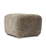 Featuring Oslo Taupe Shearling Ottoman by Four Hands at Amethyst Home. A subtle sweetheart shape paired with beige shearling plays into this ottoman's found object appeal. S-spring suspension offers a comfy place to sit and the shearling upholstery brings depth and vintage vibes throughout. Perfect styled alone or as part of a set for added drama. A design. Amethyst Home provides interior design, new home construction design consulting, vintage area rugs, and lighting in the Des Moines metro area.
