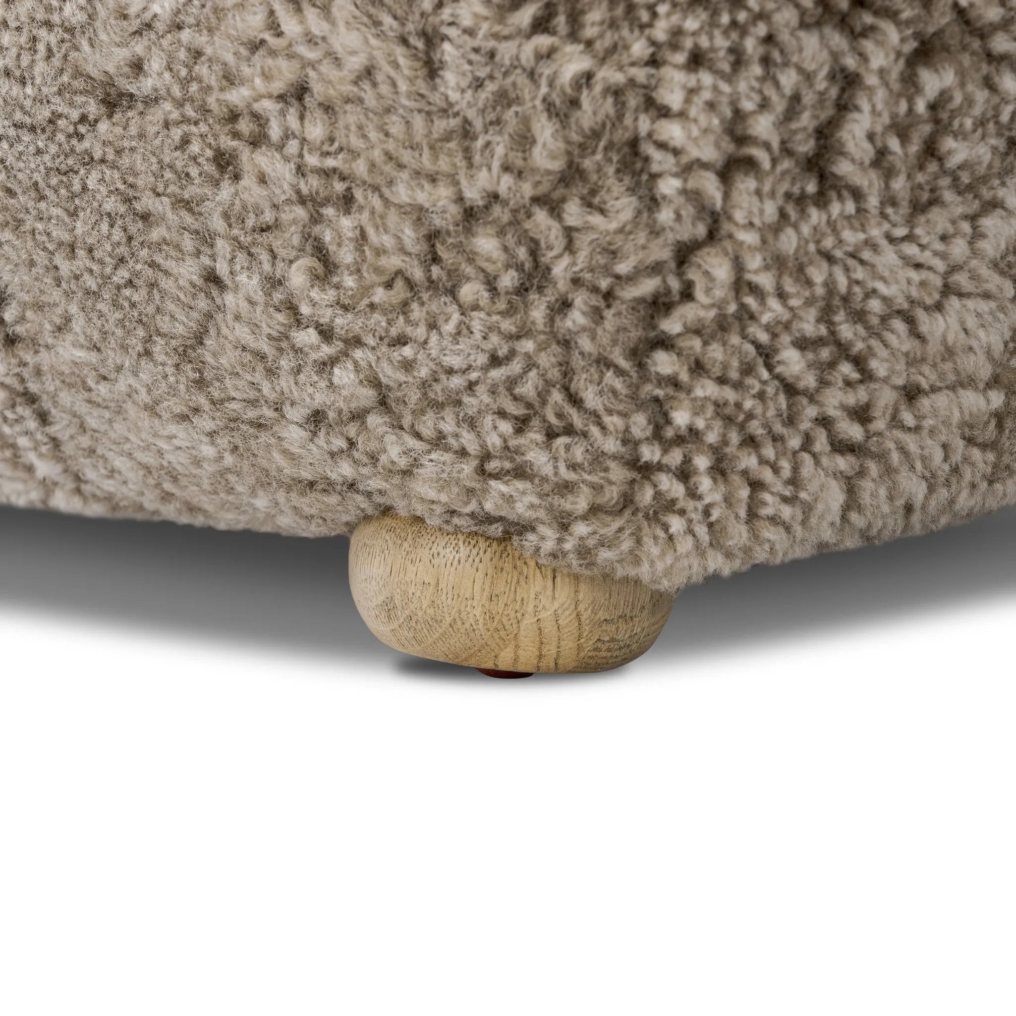 Featuring Oslo Taupe Shearling Ottoman by Four Hands at Amethyst Home. A subtle sweetheart shape paired with beige shearling plays into this ottoman's found object appeal. S-spring suspension offers a comfy place to sit and the shearling upholstery brings depth and vintage vibes throughout. Perfect styled alone or as part of a set for added drama. A de. Amethyst Home provides interior design, new home construction design consulting, vintage area rugs, and lighting in the Salt Lake City metro area.