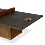 Outdoor-friendly and made for play, this ping pong table is clad in slatted teak and paired with a warm, tonal rust aluminum metal top with lots of visual movement. The teak net is removable, easily turning game time into dinner time. Includes four wooden paddles. Cover or store indoors during inclement weather and when not in use. Amethyst Home provides interior design, new home construction design consulting, vintage area rugs, and lighting in the Omaha metro area.