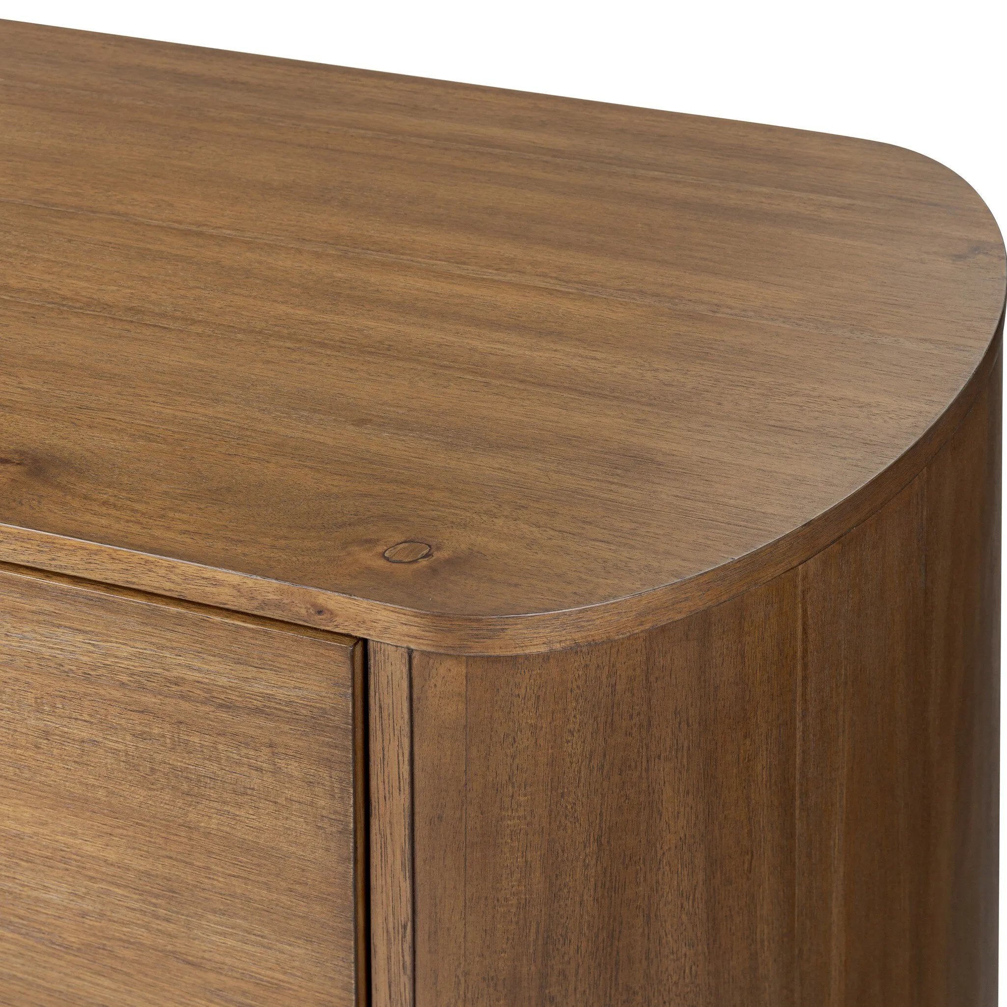 Seasoned brown acacia forms a pedestal base, bringing gentle curves to a classic dresser shape. Six drawers bring spacious storage to the bedroom Amethyst Home provides interior design, new home construction design consulting, vintage area rugs, and lighting in the Alpharetta metro area.