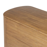 Seasoned brown acacia forms a pedestal base, bringing gentle curves to a classic dresser shape. Six drawers bring spacious storage to the bedroom Amethyst Home provides interior design, new home construction design consulting, vintage area rugs, and lighting in the Houston metro area.