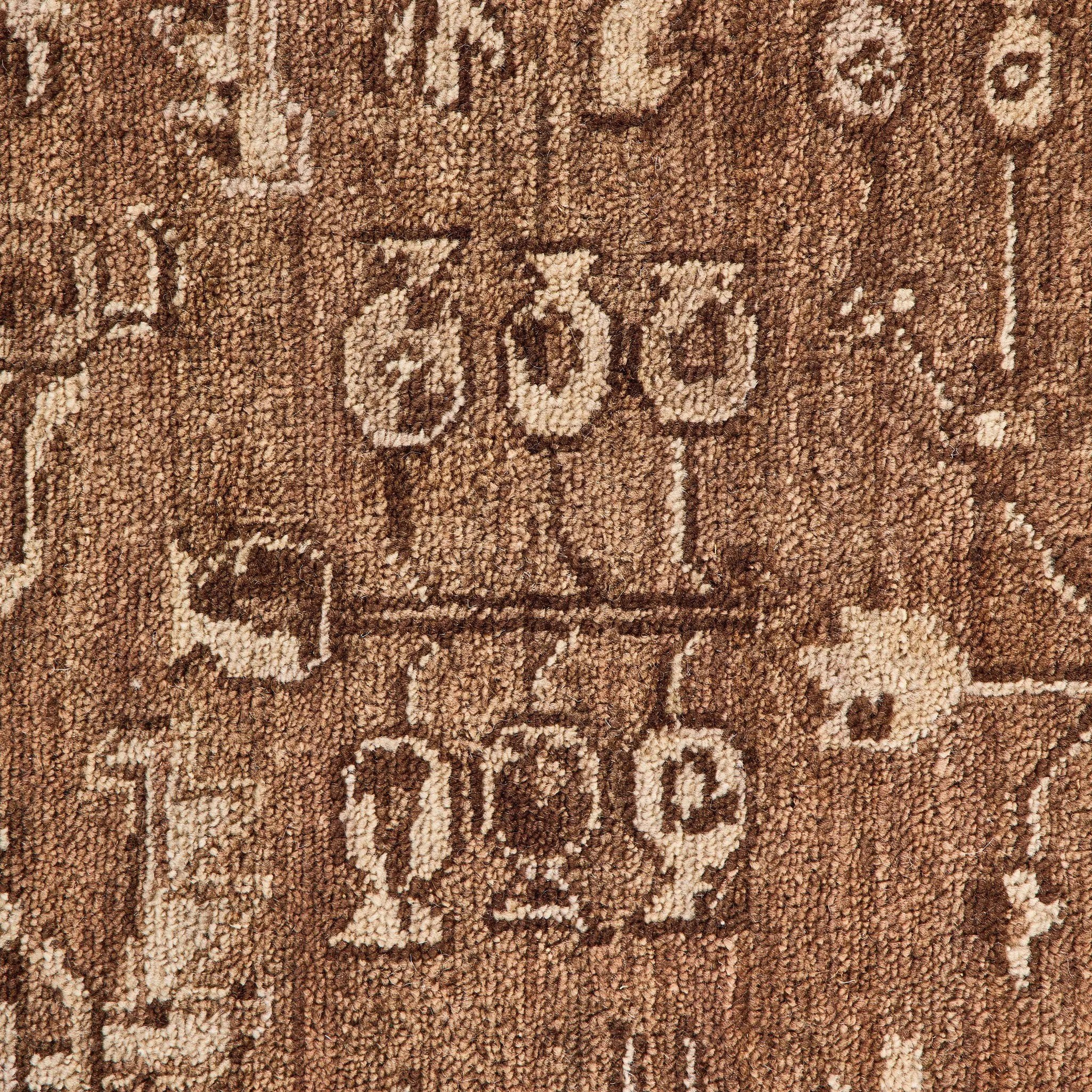 Pure wool is hand-knotted to create the rug's beautiful rustic design and appearance. The durable runner is crafted to wear beautifully over time. Due to the handcrafted nature of this rug, slight variations in sizing may occur Amethyst Home provides interior design, new home construction design consulting, vintage area rugs, and lighting in the Des Moines metro area.