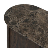 Mixed materials refresh the traditional sideboard, pairing a thick, wide base of dark brown acacia with brown marble rich with natural veining. Cylindrical details and a step base elevates the look. A spacious interior awaits storage of favorite serveware, table linens and more. Amethyst Home provides interior design, new home construction design consulting, vintage area rugs, and lighting in the Miami metro area.