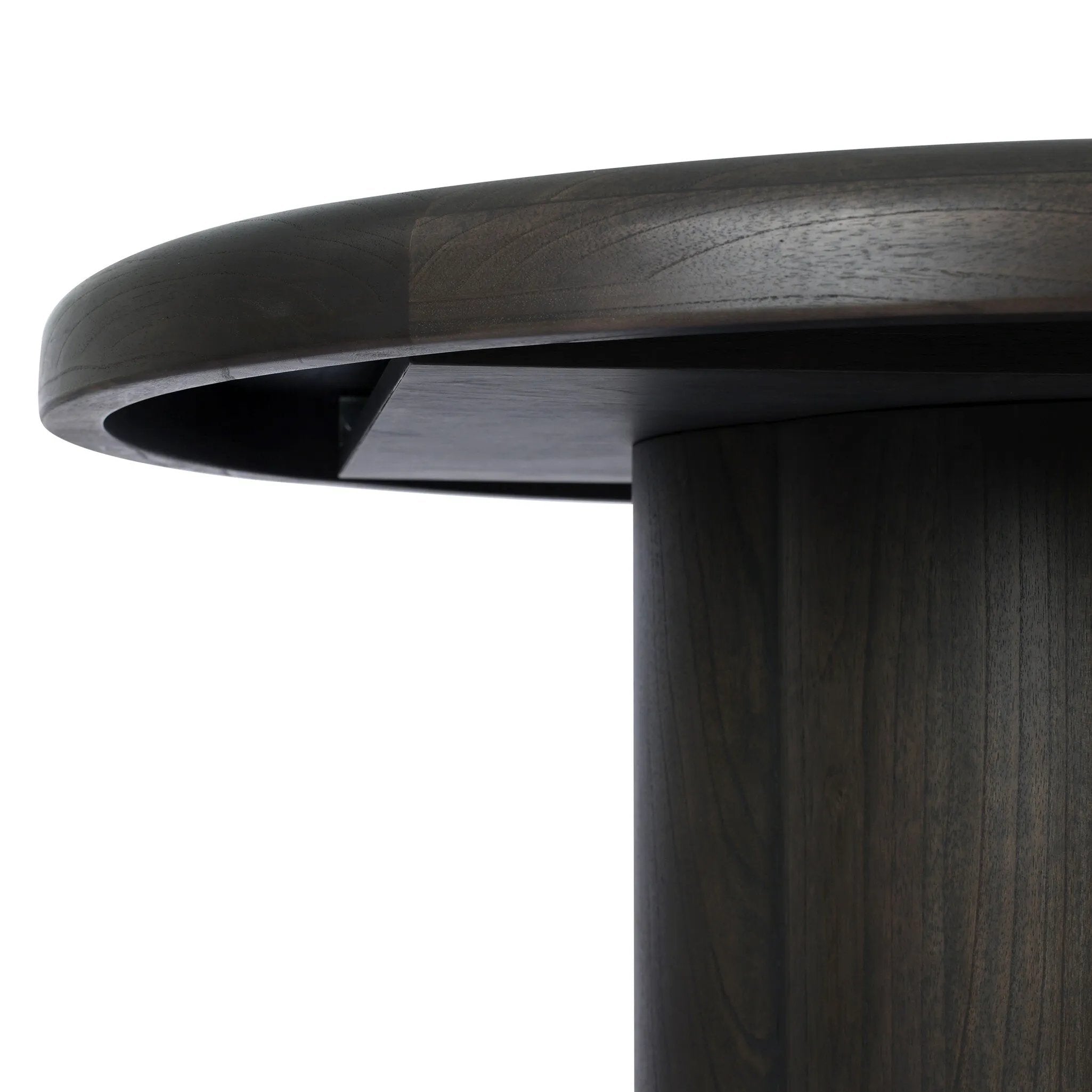 Make space for more guests with a rounded extension table of smoked black mindi, with beautiful visible graining. Inside the tabletop, a hidden mechanism allows for expansion from 48" to 68".As fans of organic modern design at Amethyst, we love the designer inspired Pemble Extension Dining Table - Smoked Black Mindi Veneer. Amethyst Home provides interior design, new home construction design consulting, vintage area rugs, and lighting in the San Diego metro area.