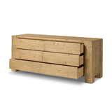 Beauty in simplicity. A clean, spacious six-drawer dresser of blonde-finished pine can be styled into a wide range of styles thanks to its neutral versatility Amethyst Home provides interior design, new home construction design consulting, vintage area rugs, and lighting in the Nashville metro area.
