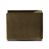 Featuring Phillip Surrey Olive Swivel Chair by Four Hands at Amethyst Home. Style meets substance in this olive cotton-blend swivel chair. Blind stitching along the seat and back cushions create a polished complement to the heritage frame. The slight pronounced seat cushion creates an illusion of being loose, but is actually a fixed cushion with expert tailor. Amethyst Home provides interior design, new home construction design consulting, vintage area rugs, and lighting in the Seattle metro area.