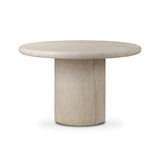 A simple pedestal shape lets the material do the talking on this outdoor dining table. Textured sand concrete resembles natural stone, with lots of natural texture and a beautiful, marble look. Cover or store indoors during inclement weather and when not in use Amethyst Home provides interior design, new home construction design consulting, vintage area rugs, and lighting in the Boston metro area.
