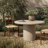 A simple pedestal shape lets the material do the talking on this outdoor dining table. Textured sand concrete resembles natural stone, with lots of natural texture and a beautiful, marble look. Cover or store indoors during inclement weather and when not in use Amethyst Home provides interior design, new home construction design consulting, vintage area rugs, and lighting in the Miami metro area.