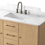 A simple transitional shape designed to function across styles. This bath vanity nods to heritage designs with the softly shaped backsplash, dowel legs, rounded corners and arch frame detail, finished with mixed hardware for added visual interest. Finished with a bath-safe sealant for moisture resistance. Amethyst Home provides interior design, new home construction design consulting, vintage area rugs, and lighting in the Charlotte metro area.