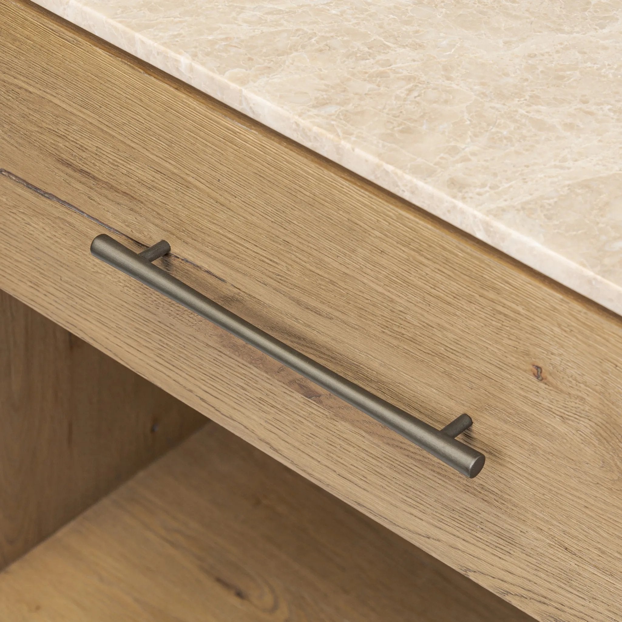 A smooth marble top adds refinement to this clean, vintage-inspired nightstand, made from worn oak with a plinth base and bronze hardware. The single top drawer and open cubby provide ample storage Amethyst Home provides interior design, new home construction design consulting, vintage area rugs, and lighting in the Alpharetta metro area.