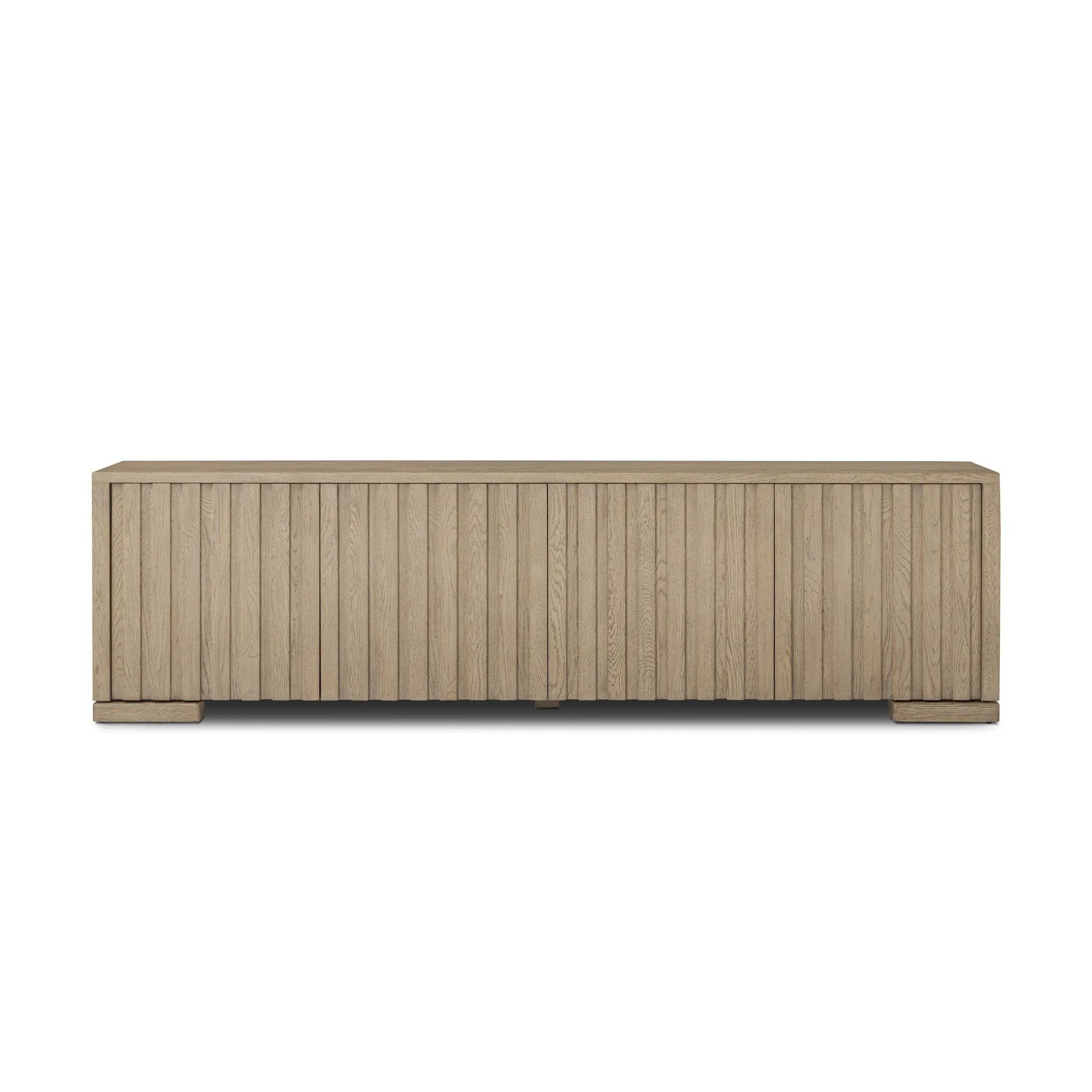 As lovers of luxe design at Amethyst, we love the warm modern inspired Ramos Media Console - Bleached Oak Veneer. This item pairs well with other brands such as Cisco Home and is perfect for modern homes Amethyst Home provides interior design, new home construction design consulting, vintage area rugs, and lighting in the Omaha metro area.