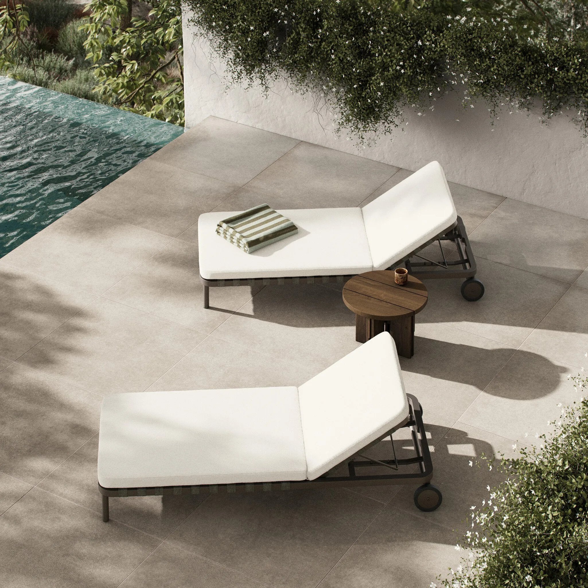 Featuring Reine Alessi Linen Outdoor Chaise by Four Hands at Amethyst Home. A campaign-inspired outdoor chaise transforms any space into your personal retreat. Monochromatic strap detailing wraps a sleek, minimalist frame, with a linen-like cushion upholstered in high-performance Italian fabric. Designed to elevate your outdoor space with a resort-like eas. Amethyst Home provides interior design, new home construction design consulting, vintage area rugs, and lighting in the Alpharetta metro area.
