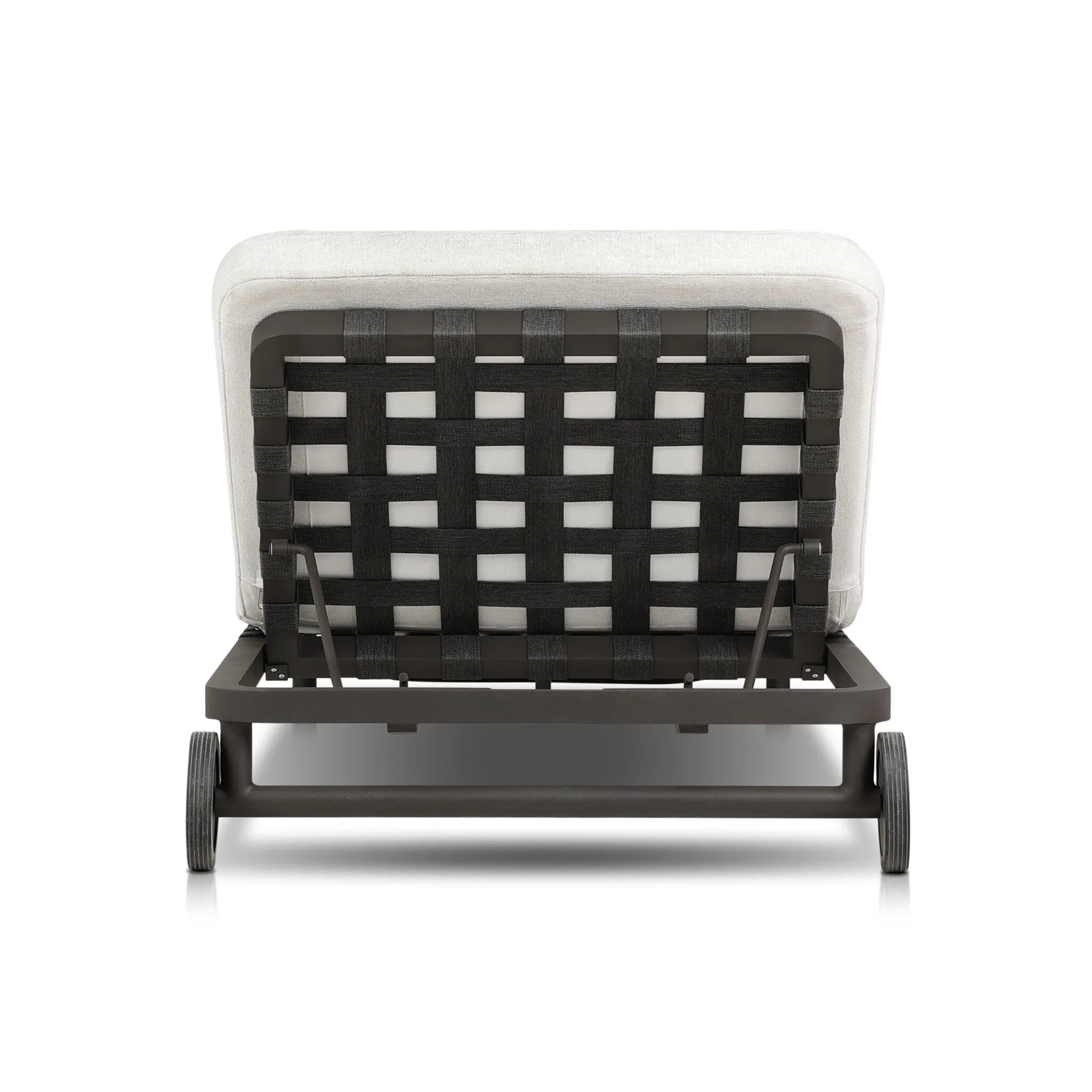 Featuring Reine Alessi Linen Outdoor Chaise by Four Hands at Amethyst Home. A campaign-inspired outdoor chaise transforms any space into your personal retreat. Monochromatic strap detailing wraps a sleek, minimalist frame, with a linen-like cushion upholstered in high-performance Italian fabric. Designed to elevate your outdoor space with a resort-like ease. Pe. Amethyst Home provides interior design, new home construction design consulting, vintage area rugs, and lighting in the Omaha metro area.