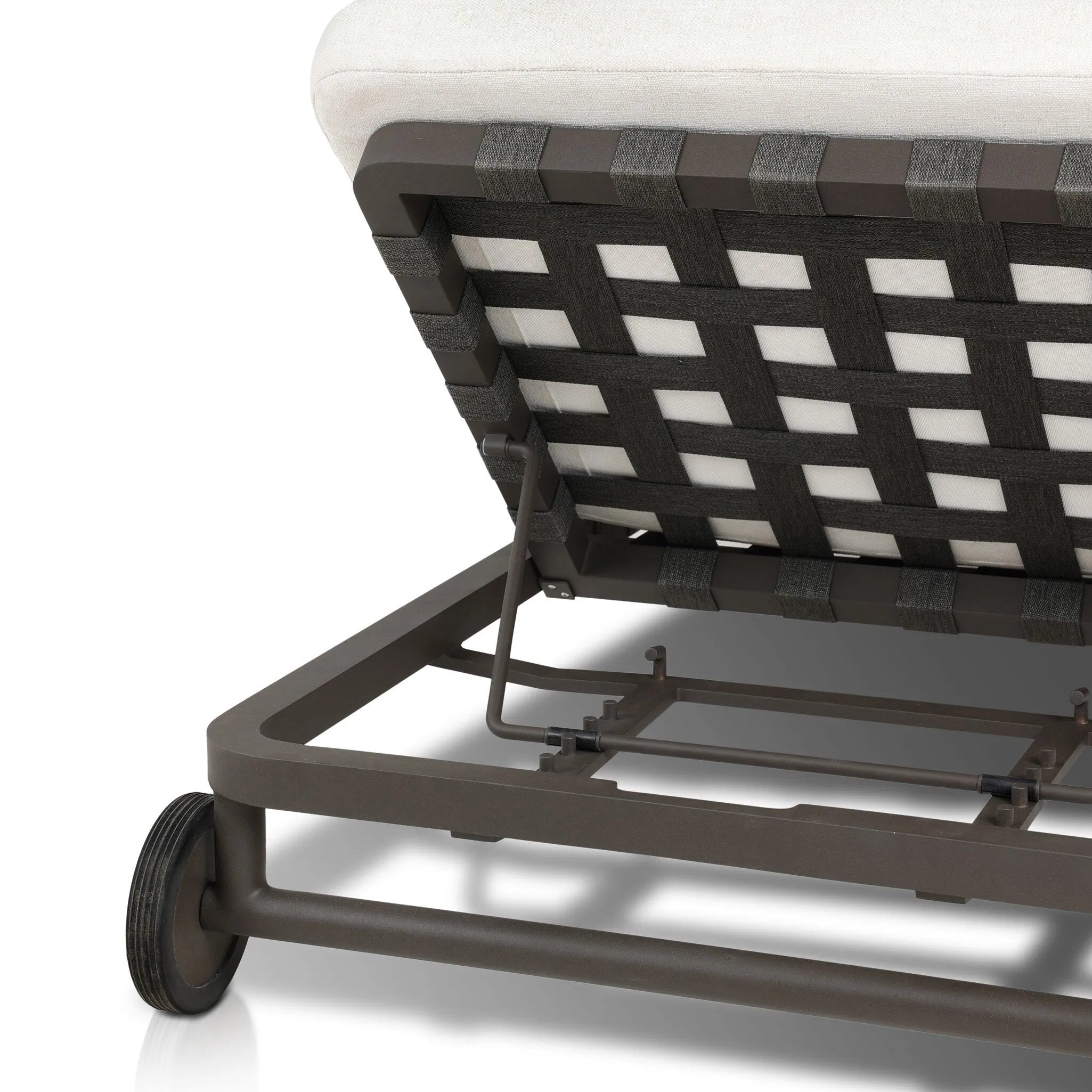 Featuring Reine Alessi Linen Outdoor Chaise by Four Hands at Amethyst Home. A campaign-inspired outdoor chaise transforms any space into your personal retreat. Monochromatic strap detailing wraps a sleek, minimalist frame, with a linen-like cushion upholstered in high-performance Italian fabric. Designed to elevate your outdoor space with a resort-like eas. Amethyst Home provides interior design, new home construction design consulting, vintage area rugs, and lighting in the Washington metro area.