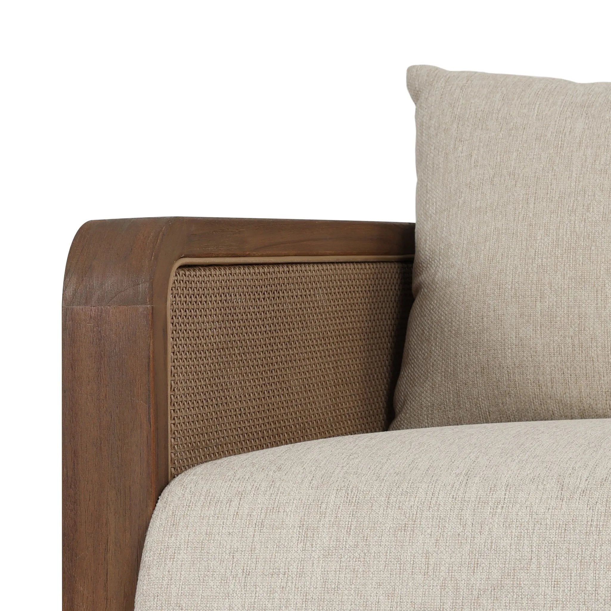 Softness is the story of this mixed material outdoor chair. With thick, sink-in cushioning and a loose pillow on the seatback, the silhouette comes together with a barrel-shaped, FSC®-certified teak frame featuring a crosshatch cane panel. Cover or store inside during inclement weather and when not in use. Amethyst Home provides interior design, new home construction design consulting, vintage area rugs, and lighting in the Scottsdale metro area.