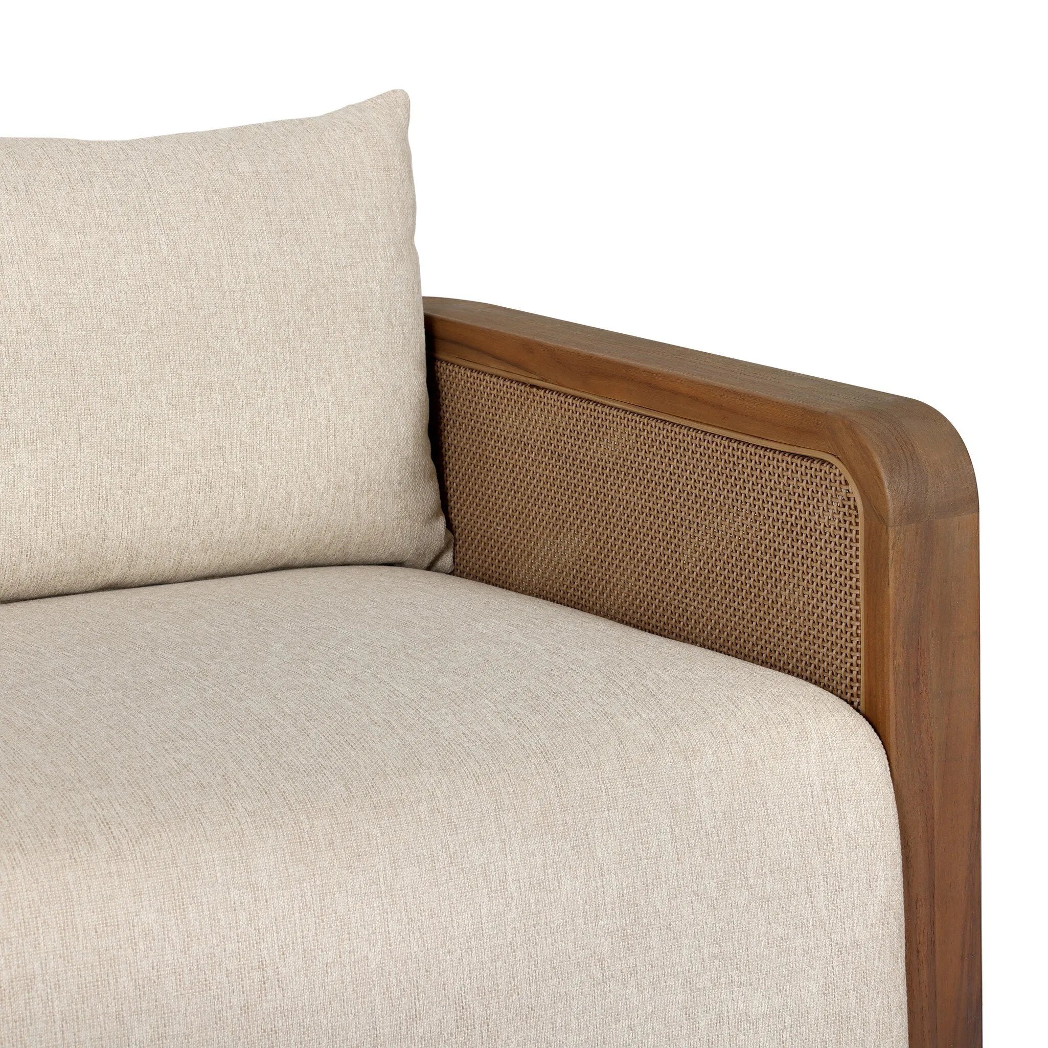 Softness is the story of this mixed material outdoor sofa. With thick, sink-in cushioning and loose pillows on the seatback, the silhouette comes together with a barrel-shaped, FSC®-certified teak frame featuring a crosshatch cane panel. Cover or store inside during inclement weather and when not in use. Amethyst Home provides interior design, new home construction design consulting, vintage area rugs, and lighting in the Boston metro area.