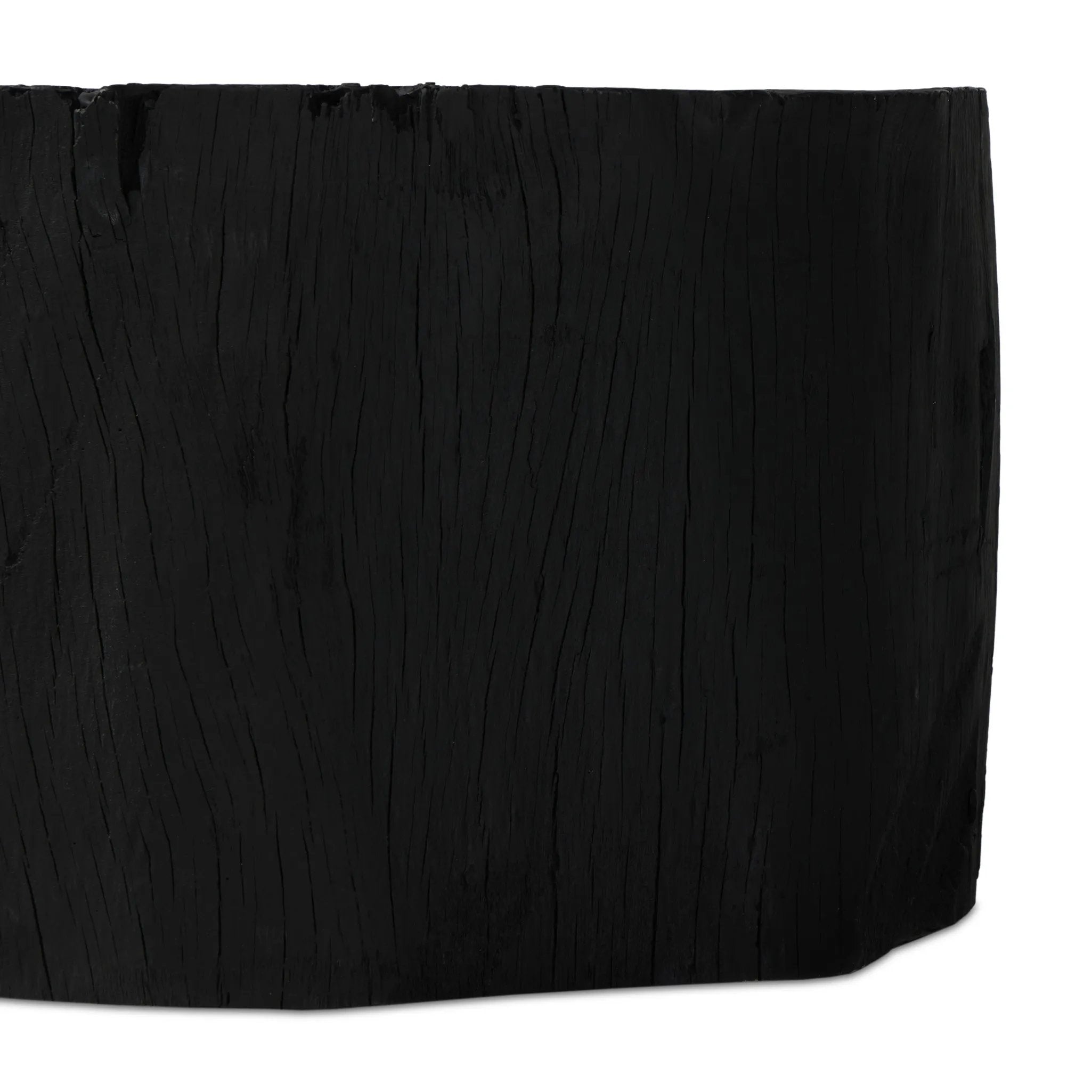 Anchor your living space with a style inspired by the beautiful simplicity of nature. Made of black-finished resin, the shape for this special piece is molded from a tree trunk, then cast in resin to recreate the same shape and texture of the trunk — talk about a true statement piece Amethyst Home provides interior design, new home construction design consulting, vintage area rugs, and lighting in the Calabasas metro area.