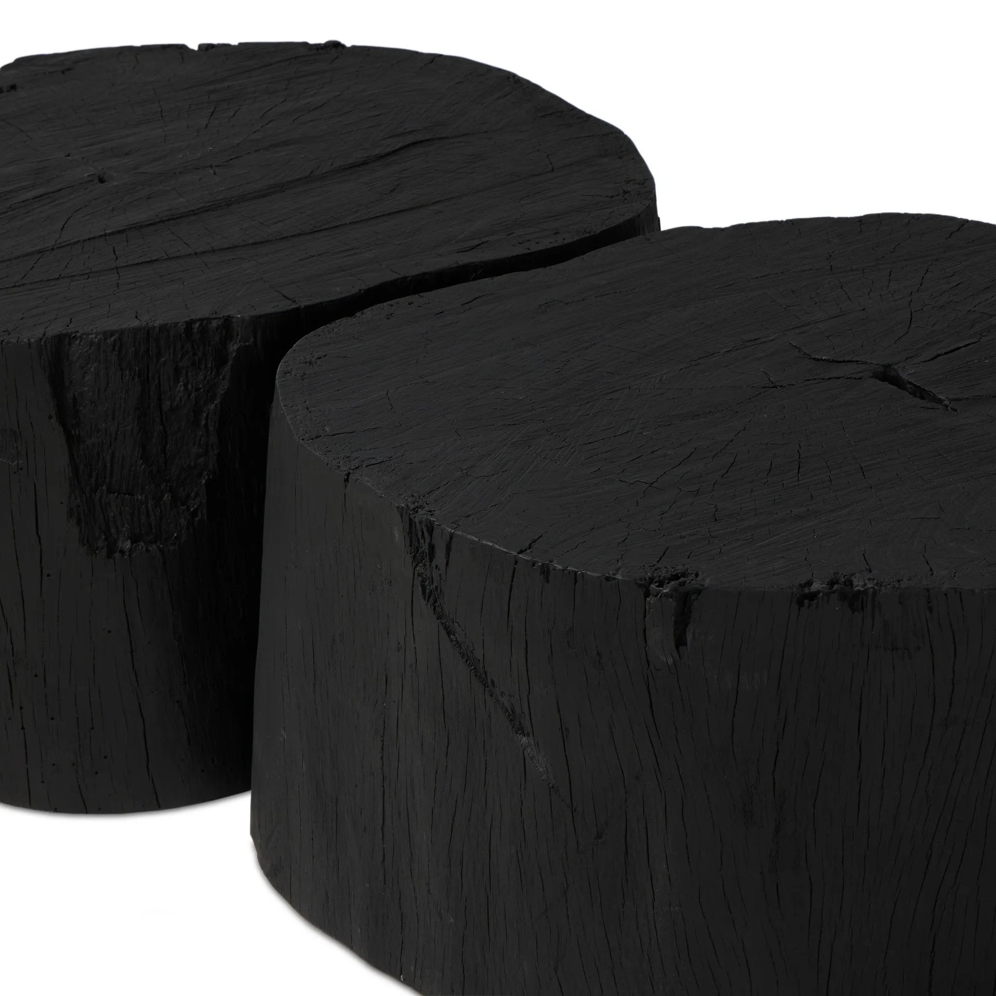 Anchor your living space with a style inspired by the beautiful simplicity of nature. Made of black-finished resin, the shape for this special piece is molded from a tree trunk, then cast in resin to recreate the same shape and texture of the trunk — talk about a true statement piece Amethyst Home provides interior design, new home construction design consulting, vintage area rugs, and lighting in the Scottsdale metro area.