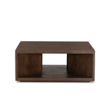 A coffee table crafted of solid mango with a warm brown finish. Simple, modern shaping to easily suit a range of styles and spaces. Great alone or paired.As lovers of organic modern aesthetics at Amethyst, we love the designer inspired Rico Coffee Table - Warm Brown Mango. Amethyst Home provides interior design, new home construction design consulting, vintage area rugs, and lighting in the Scottsdale metro area.