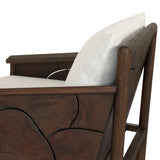 Inset panels of solid teak root are laminated to create a mosaic look against beautiful natural graining. Between angled armrests, cushioned seating is upholstered in a durable Italian fabric for an elevated look with a linen hand feel. Amethyst Home provides interior design, new home construction design consulting, vintage area rugs, and lighting in the Los Angeles metro area.