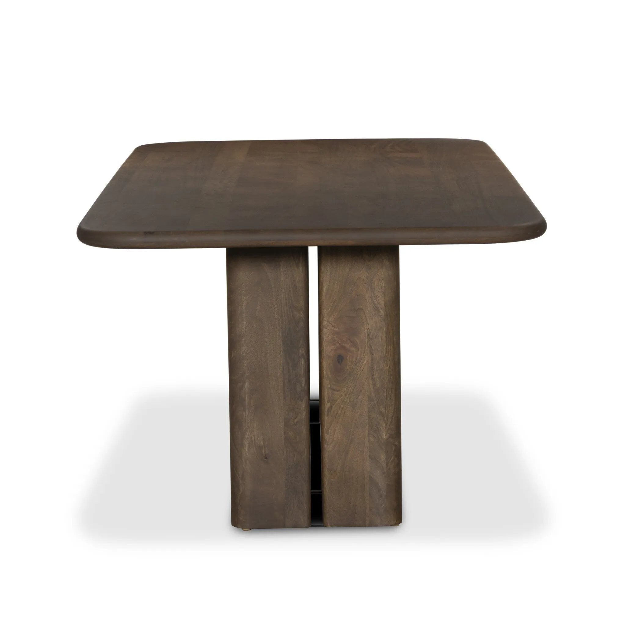 Crafted of solid mango with a washed taupe finish, this stately, rectangular dining table features a square motif coursing its silhouette: two squared pillar legs constructed of rounded panels which appear to float. Amethyst Home provides interior design, new home construction design consulting, vintage area rugs, and lighting in the Seattle metro area.