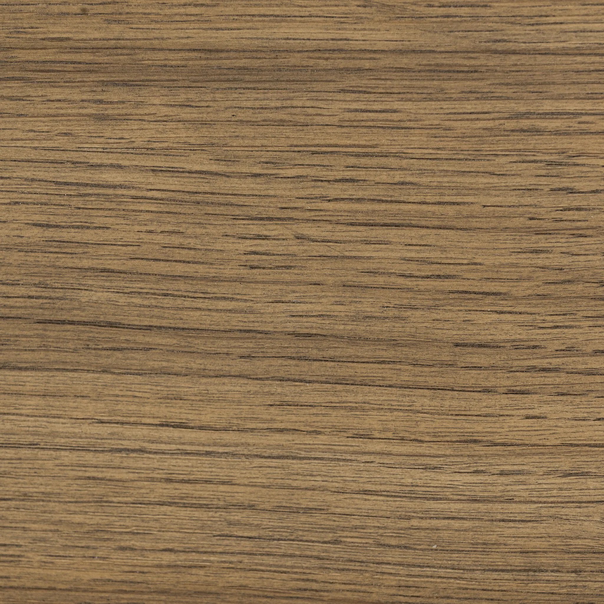 Rounded, chunky dowel legs in an amber oak finish frame the tan top-grain leather headboard of this simple-but-striking bed frame Amethyst Home provides interior design, new home construction design consulting, vintage area rugs, and lighting in the San Diego metro area.