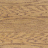 Create storage space in the bedroom with a five-drawer dresser of amber-finished oak. Chunky dowel legs support a tall silhouette and overhang top, all finished out with simple gunmetal hardware Amethyst Home provides interior design, new home construction design consulting, vintage area rugs, and lighting in the Kansas City metro area.