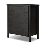 Create storage space in the bedroom with a five-drawer dresser of ebony-finished oak. Chunky dowel legs support a tall silhouette and overhang top, all finished out with simple gunmetal hardware Amethyst Home provides interior design, new home construction design consulting, vintage area rugs, and lighting in the Charlotte metro area.