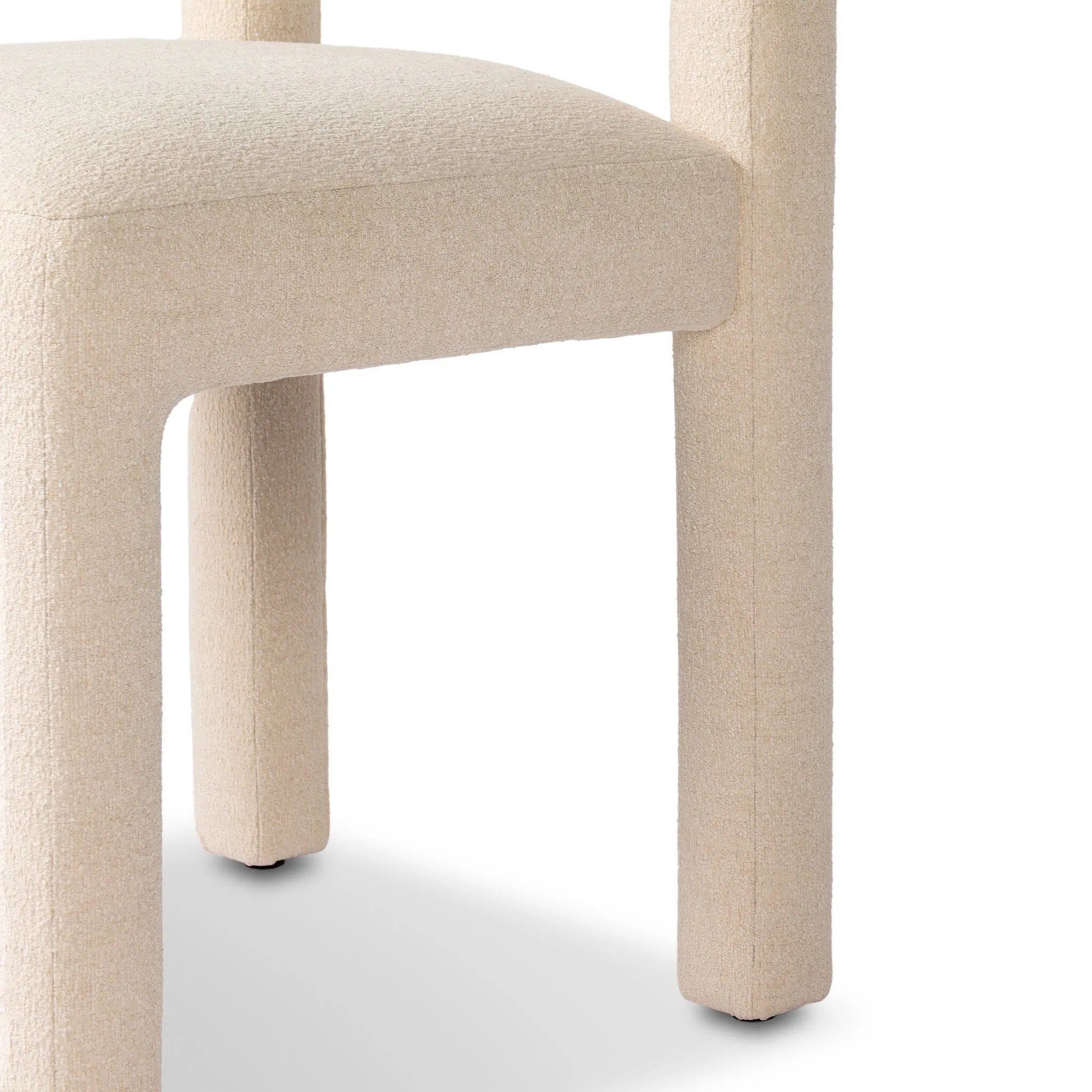 Fit for modern dining, this clean-styled chair is fully upholstered in a specialized performance fabric. An open back connects down to the cylindrical legs. Slight scale and squared off shape are great for smaller dining areas. Amethyst Home provides interior design, new home construction design consulting, vintage area rugs, and lighting in the Charlotte metro area.