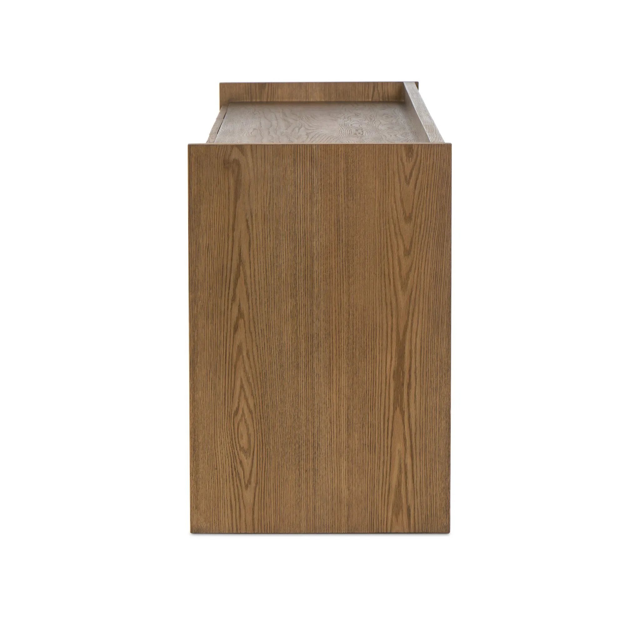 Resawn warm oak gives this sideboard's simple paneled design its standout striations. The paneled frame has a gallery top, and the bottom shelf provides open storage Amethyst Home provides interior design, new home construction design consulting, vintage area rugs, and lighting in the Austin metro area.