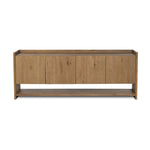 Resawn warm oak gives this sideboard's simple paneled design its standout striations. The paneled frame has a gallery top, and the bottom shelf provides open storage Amethyst Home provides interior design, new home construction design consulting, vintage area rugs, and lighting in the Boston metro area.