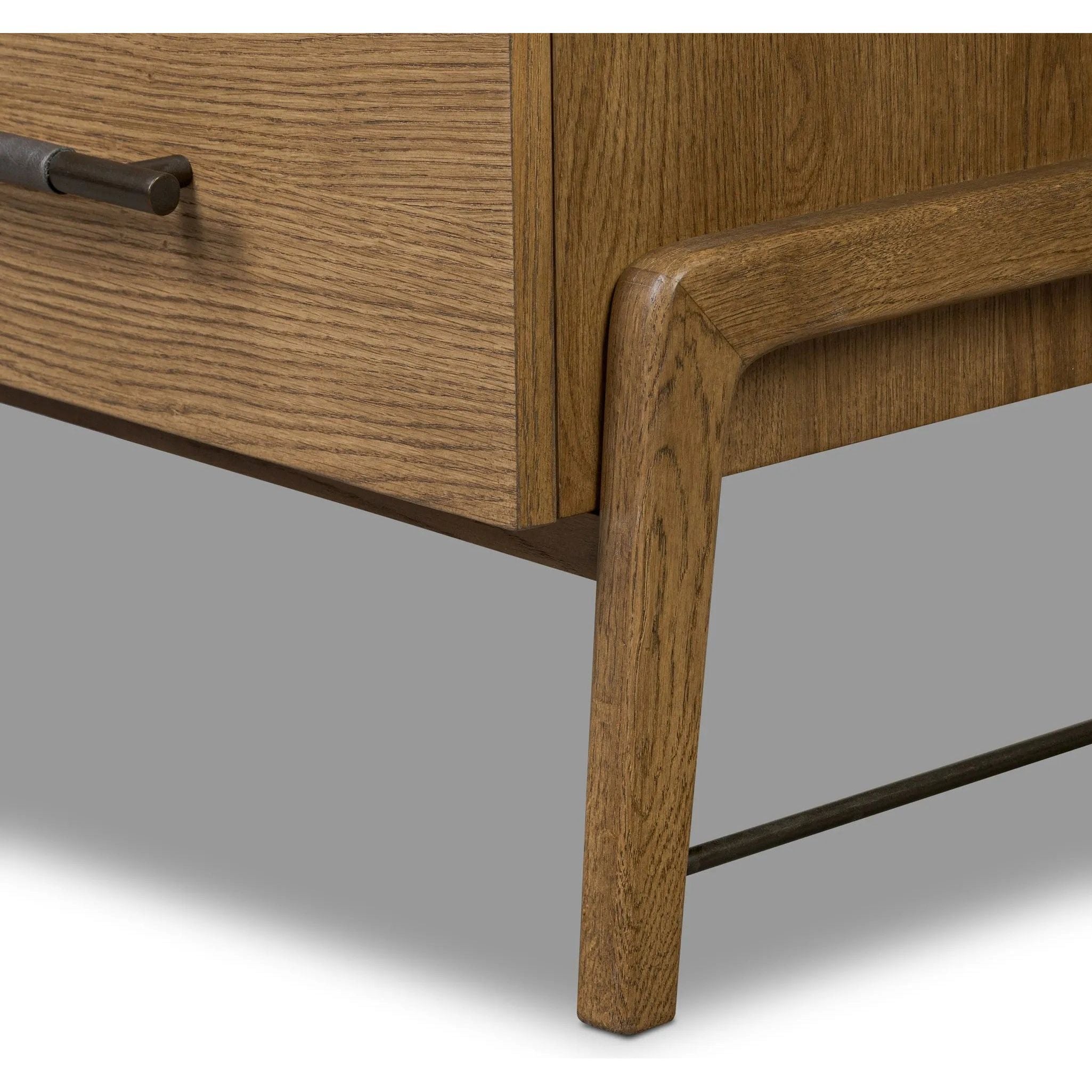 Amber-finished oak forms a clean silhouette for three spacious drawers with iron hardware wrapped in black top-grain leather. This item has been modified to comply with the STURDY Act. See a full list of modified products and data changes in the “STURDY Act” file in the Downloads section below Amethyst Home provides interior design, new home construction design consulting, vintage area rugs, and lighting in the Los Angeles metro area.