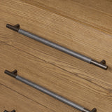 Amber-finished oak forms a clean silhouette for three spacious drawers with iron hardware wrapped in black top-grain leather. This item has been modified to comply with the STURDY Act. See a full list of modified products and data changes in the “STURDY Act” file in the Downloads section below Amethyst Home provides interior design, new home construction design consulting, vintage area rugs, and lighting in the Scottsdale metro area.