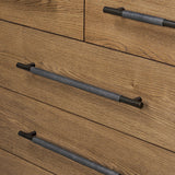 Amber-finished oak forms a clean silhouette for six spacious drawers with iron hardware wrapped in black top-grain leather. This item has been modified to comply with the STURDY Act. See a full list of modified products and data changes in the “STURDY Act” file in the Downloads section below Amethyst Home provides interior design, new home construction design consulting, vintage area rugs, and lighting in the Scottsdale metro area.