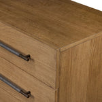 Amber-finished oak forms a clean silhouette for eight spacious drawers with iron hardware wrapped in black top-grain leather. This item has been modified to comply with the STURDY Act. See a full list of modified products and data changes in the “STURDY Act” file in the Downloads section below Amethyst Home provides interior design, new home construction design consulting, vintage area rugs, and lighting in the Calabasas metro area.