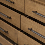 Amber-finished oak forms a clean silhouette for eight spacious drawers with iron hardware wrapped in black top-grain leather. This item has been modified to comply with the STURDY Act. See a full list of modified products and data changes in the “STURDY Act” file in the Downloads section below Amethyst Home provides interior design, new home construction design consulting, vintage area rugs, and lighting in the Kansas City metro area.