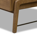 Amber-finished oak forms a clean silhouette for eight spacious drawers with iron hardware wrapped in black top-grain leather. This item has been modified to comply with the STURDY Act. See a full list of modified products and data changes in the “STURDY Act” file in the Downloads section below Amethyst Home provides interior design, new home construction design consulting, vintage area rugs, and lighting in the San Diego metro area.