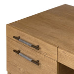 Amber-finished oak crafts shapes a clean silhouette, accented with iron hardware wrapped in black top-grain leather. Vary-sized drawers offer plenty of storage, while outset legs bring a design-forward touch Amethyst Home provides interior design, new home construction design consulting, vintage area rugs, and lighting in the Nashville metro area.