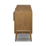 Amber-finished oak forms a clean silhouette with plenty of storage, accented with long iron hardware wrapped in black top-grain leather. Outset legs add an element of interest. Rear cutouts for cord management Amethyst Home provides interior design, new home construction design consulting, vintage area rugs, and lighting in the Houston metro area.