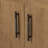 Amber-finished oak forms a clean silhouette with plenty of storage, accented with long iron hardware wrapped in black top-grain leather. Outset legs add an element of interest. Rear cutouts for cord management Amethyst Home provides interior design, new home construction design consulting, vintage area rugs, and lighting in the Scottsdale metro area.