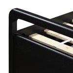 Ebony-finished oak frames a sling-style headboard made from top-grain leather, with subtly rounded edges and metal dowel detailing Amethyst Home provides interior design, new home construction design consulting, vintage area rugs, and lighting in the Boston metro area.