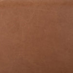 Ebony-finished oak frames a sling-style headboard made from top-grain leather, with subtly rounded edges and metal dowel detailing Amethyst Home provides interior design, new home construction design consulting, vintage area rugs, and lighting in the Nashville metro area.