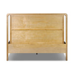 Amber-finished solid oak frames a floating, sling-style headboard made from black top-grain leather, with subtly rounded edges and metal dowel detailing Amethyst Home provides interior design, new home construction design consulting, vintage area rugs, and lighting in the Omaha metro area.