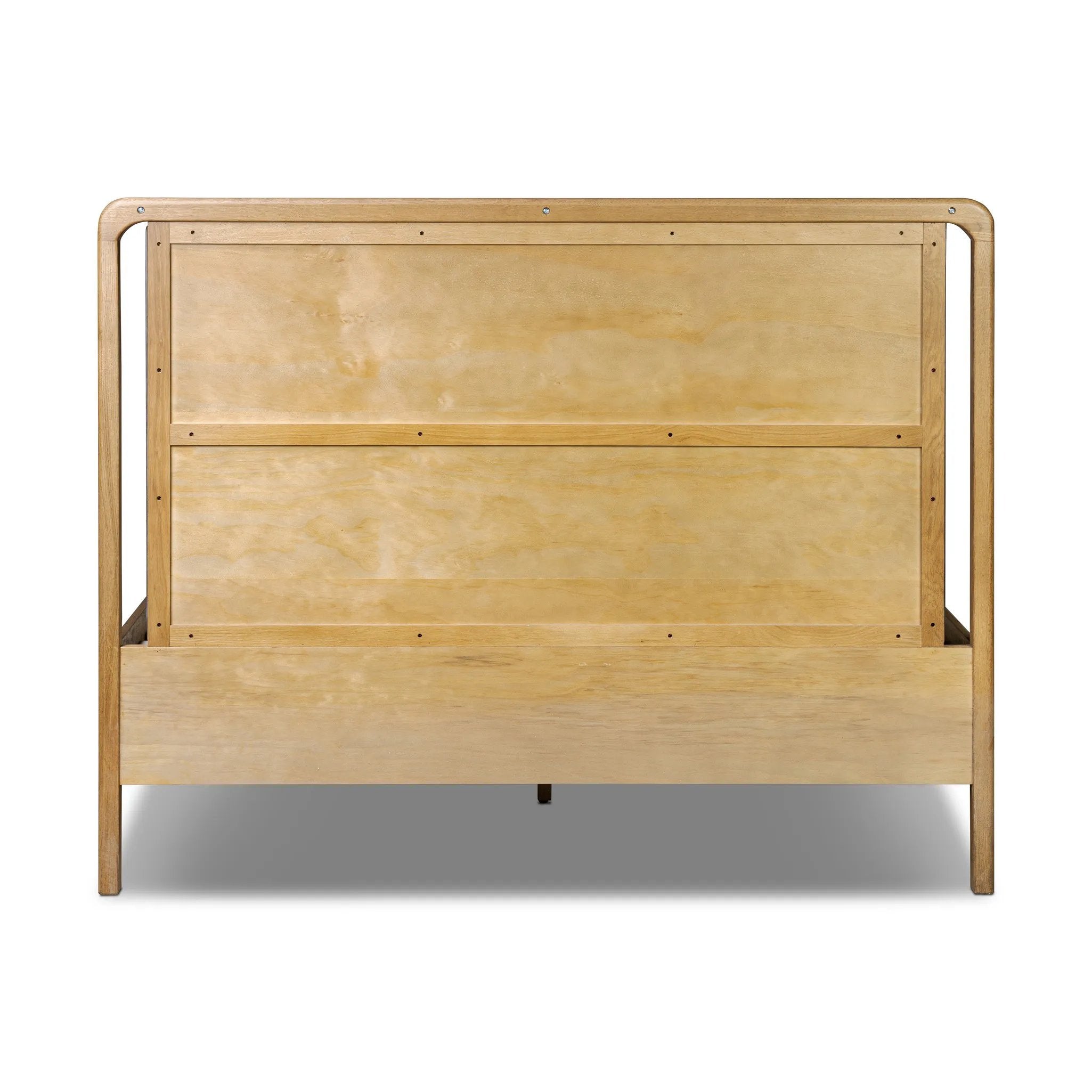 Amber-finished solid oak frames a floating, sling-style headboard made from black top-grain leather, with subtly rounded edges and metal dowel detailing Amethyst Home provides interior design, new home construction design consulting, vintage area rugs, and lighting in the Omaha metro area.