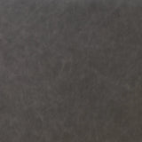 Amber-finished solid oak frames a floating, sling-style headboard made from black top-grain leather, with subtly rounded edges and metal dowel detailing Amethyst Home provides interior design, new home construction design consulting, vintage area rugs, and lighting in the Portland metro area.