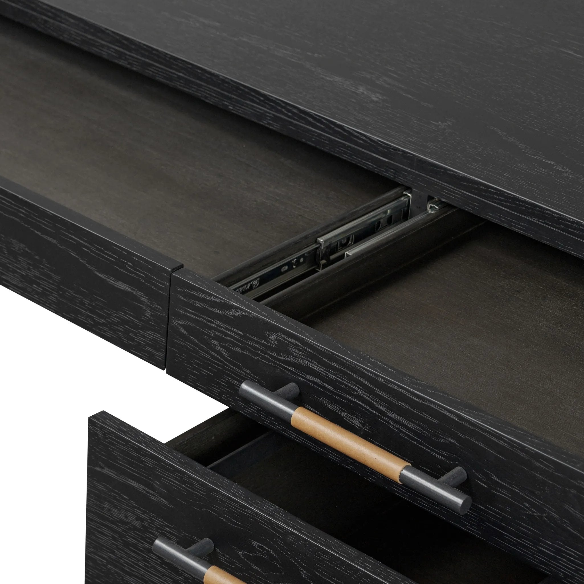 Featuring Rosedale Ebony Oak Veneer Executive Desk by Four Hands at Amethyst Home. Accented with iron hardware wrapped in tan top-grain leather, dark-finished oak crafts shapes a clean silhouette. Vary-sized drawers offer plenty of storage, while outset legs bring a design-forward touch.Overall Dimensions: 72.75"w x 30.00"d x 30.00"hWeight : 202.82 lbsMater. Amethyst Home provides interior design, new home construction design consulting, vintage area rugs, and lighting in the Charlotte metro area.