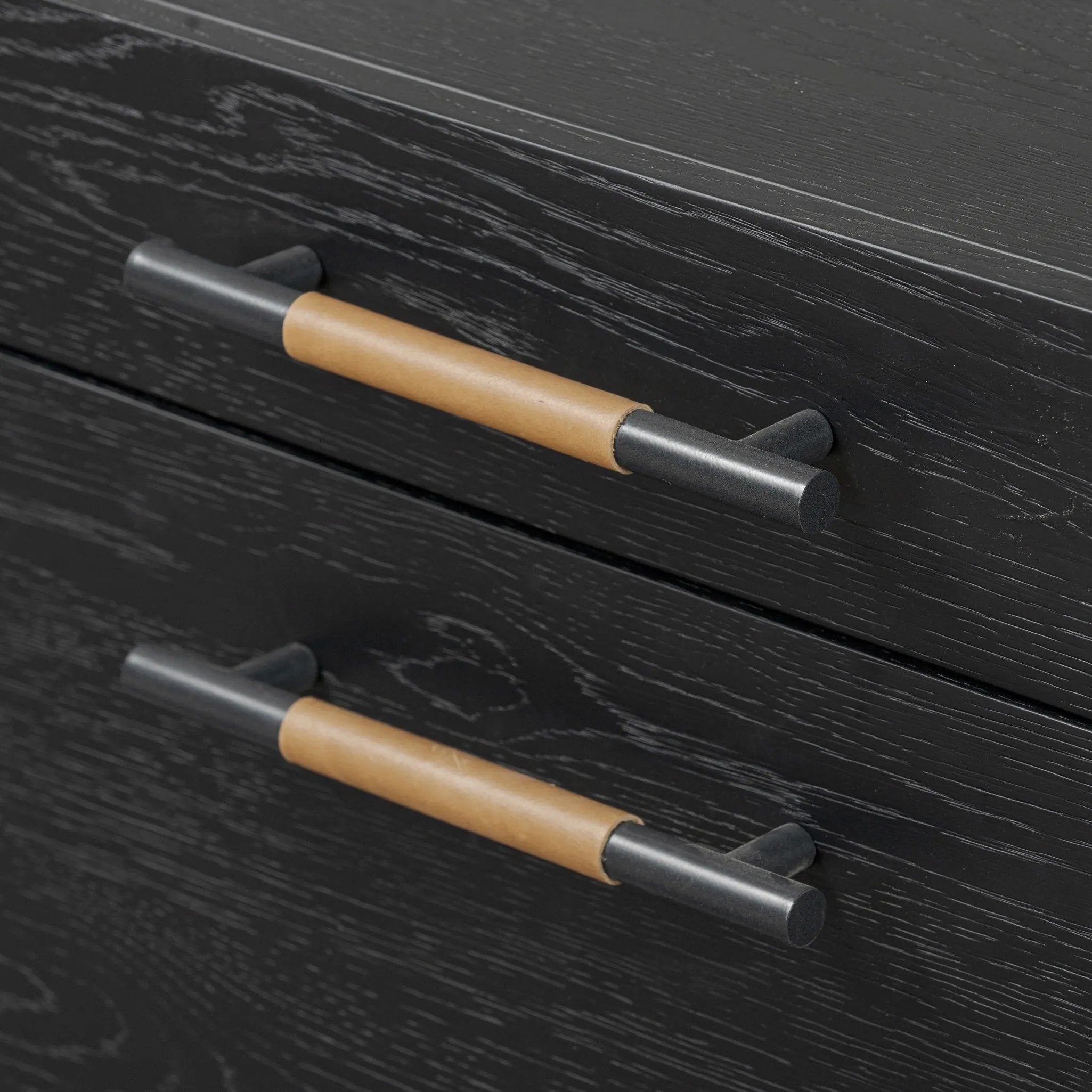 Featuring Rosedale Ebony Oak Veneer Executive Desk by Four Hands at Amethyst Home. Accented with iron hardware wrapped in tan top-grain leather, dark-finished oak crafts shapes a clean silhouette. Vary-sized drawers offer plenty of storage, while outset legs bring a design-forward touch.Overall Dimensions: 72.75"w x 30.00"d x 30.00"hWeight : 202.82 lbsMateria. Amethyst Home provides interior design, new home construction design consulting, vintage area rugs, and lighting in the Houston metro area.