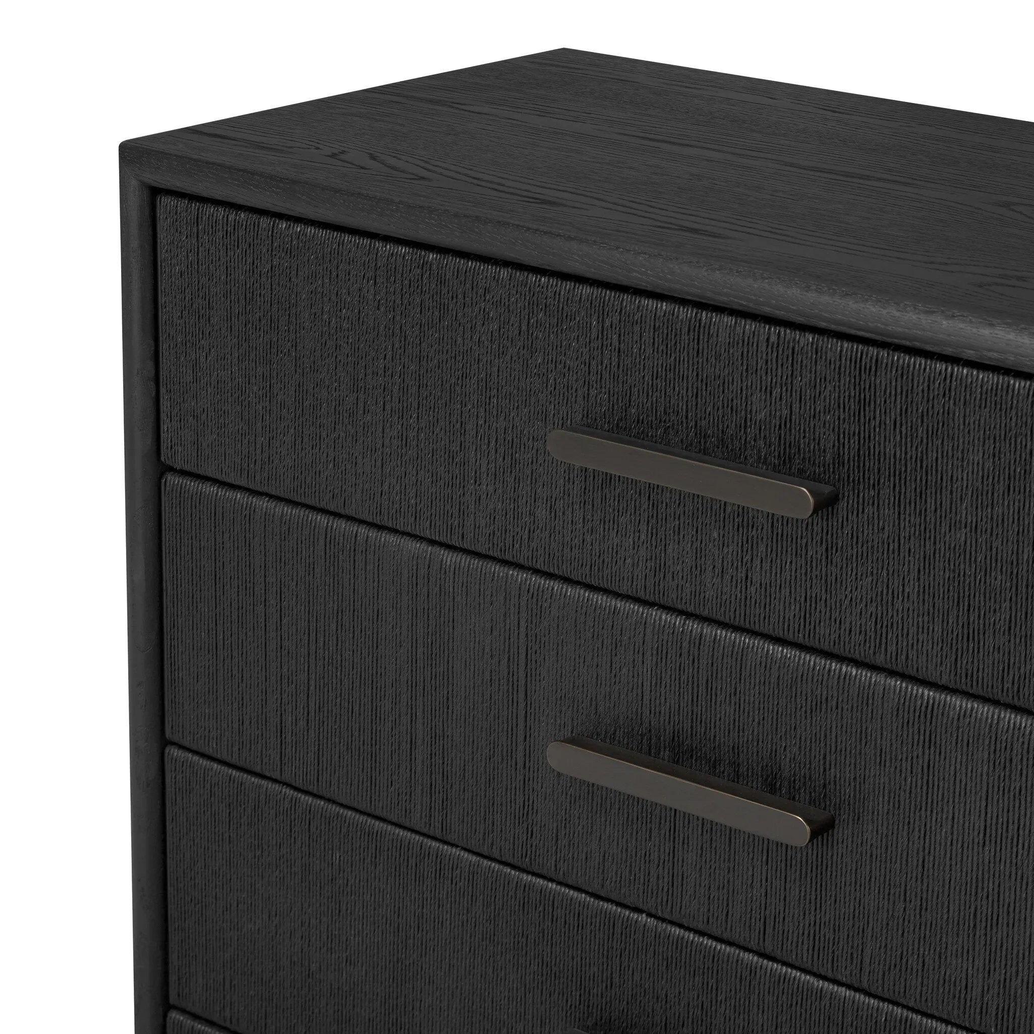 Elevate your bedroom styling with a storage-driven dresser of black-finished oak. A smooth top pairs with eight spacious drawers covered with woven paper cord. The result: a dark, Scandinavian-inspired look that will work into your collection beautifully Amethyst Home provides interior design, new home construction design consulting, vintage area rugs, and lighting in the Monterey metro area.